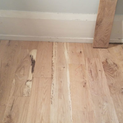 Flooring Progress in the Living Room and Hallway