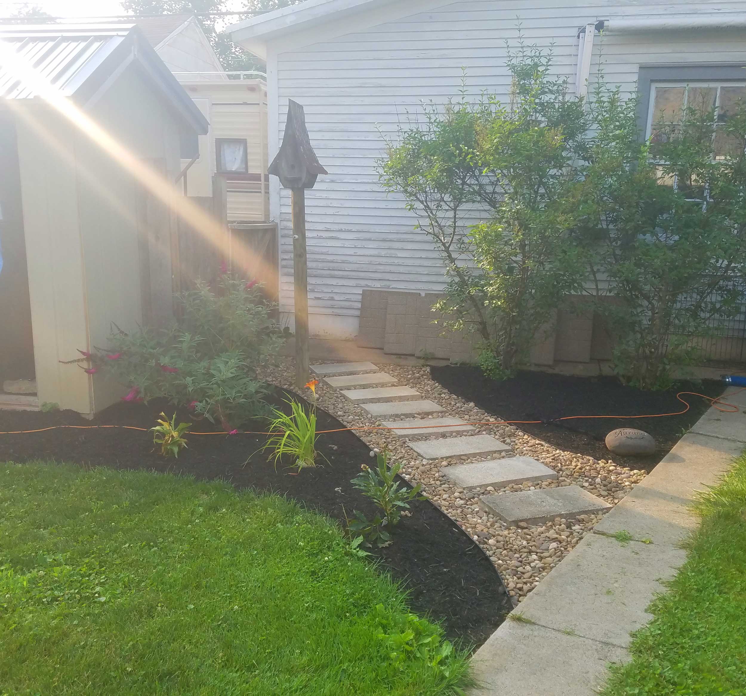 stone walkway in backyard