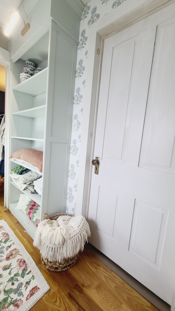 repurposed book shelf to built-in with custom trim and crown moulding