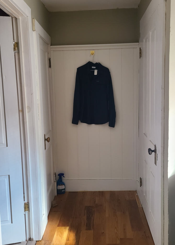 charming and cozy book nook before when it was a dark and dingy hallway