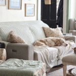 There’s something about a cottage-inspired home that instantly feels welcoming. Maybe it’s the layers of soft fabrics, the warm glow of a lamp in the corner, or the way everyday items are displayed with charm. To me, “cozy” doesn’t mean cluttered — it means creating a space where you can truly relax and enjoy the simple beauty of home. Over the years, I’ve discovered a few essentials that always make our home feel inviting and comfortable. These cozy touches are timeless, affordable, and easy to add no matter the size or style of your home. 🛋️ Soft Layers & Textiles Nothing says cozy like a stack of pillows and a throw draped over the sofa. I love mixing neutral tones with subtle patterns — florals, stripes, or checks — to create that layered, collected look. In bedrooms, a quilt or coverlet at the foot of the bed adds both charm and warmth. Image Suggestion: Wide shot of your living room sofa with throws and pillows layered. Pin-worthy vertical image. 🕯️ Warm Lighting Overhead lighting can feel harsh, so I rely on lamps, sconces, and even candles to create a warm glow. A cottage-inspired home shines with layered lighting — the soft glow of a lamp in the evening makes a room instantly more inviting. Image Suggestion: Close-up of a side table with a lamp, book stack, and candle burning. 🌿 Natural Elements Fresh flowers in simple vases, a basket by the door, a vintage wooden bowl — natural elements bring warmth and texture to a cottage home. Even faux greenery works if you mix it thoughtfully. Image Suggestion: Seasonal arrangement on your entryway table or kitchen counter (sunflowers, hydrangeas, or eucalyptus in fall). 📚 Personal Touches Books, artwork, and vintage finds tell your story. A stack of well-loved novels, a thrifted oil painting, or a collection of blue-and-white dishes make a space feel lived in and personal. Cozy isn’t about buying new — it’s about surrounding yourself with what you love. Image Suggestion: Styled bookcase or coffee table vignette with books + art + personal accents. 🧺 Comfort Underfoot Rugs are one of the easiest ways to add coziness to a room. I love mixing a natural jute or sisal rug with a smaller patterned rug layered on top. It adds instant warmth and that collected, cottage feel. Image Suggestion: Angle of your living room or bedroom showing layered rugs. 🍵 Kitchen Comforts A cozy home isn’t complete without the kitchen. For me, it’s having a favorite mug for my morning coffee, simple linen towels, and a candle flickering while I cook dinner. These small details make the everyday feel special. Image Suggestion: Coffee setup with mugs + candle + linen towel. Conclusion At the end of the day, creating a cozy cottage-inspired home isn’t about following strict rules. It’s about layering soft textures, adding warm light, and filling your rooms with pieces that feel personal and meaningful. These cozy essentials are what make our house feel like home — and I hope they inspire you to create the same in your space.